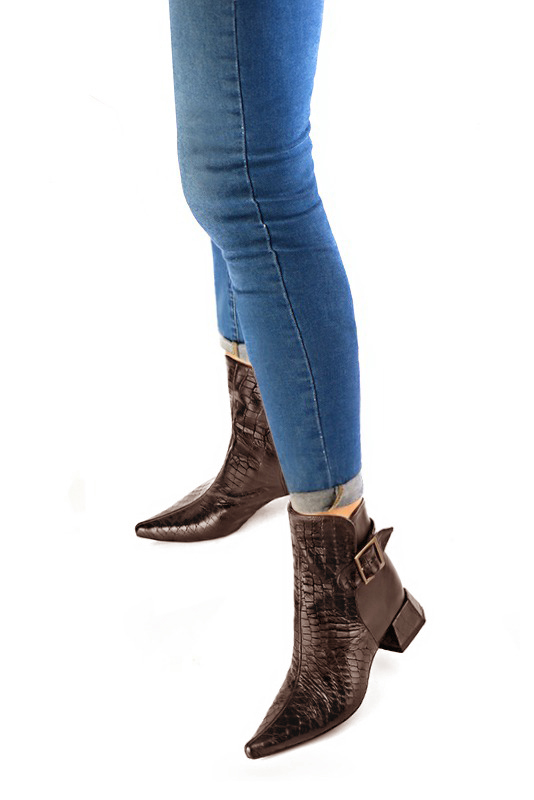 Dark brown women's ankle boots with buckles at the back. Pointed toe. Low flare heels. Worn view - Florence KOOIJMAN